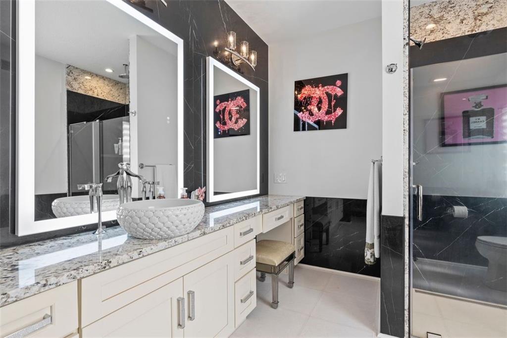 113 Hemingway Lane Coraopolis, PA 15108 - Photo 25 of 44 a bathroom with a granite countertop sink and a mirror