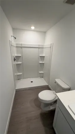 a kitchen with a stove and a microwave