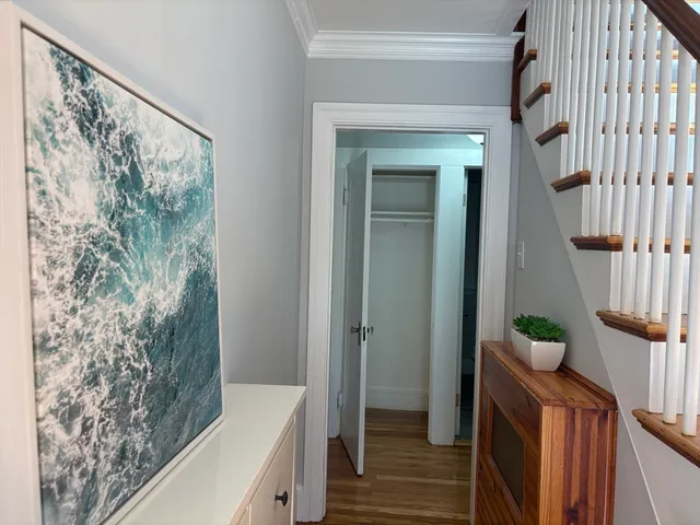 a bathroom with a bathtub and shower
