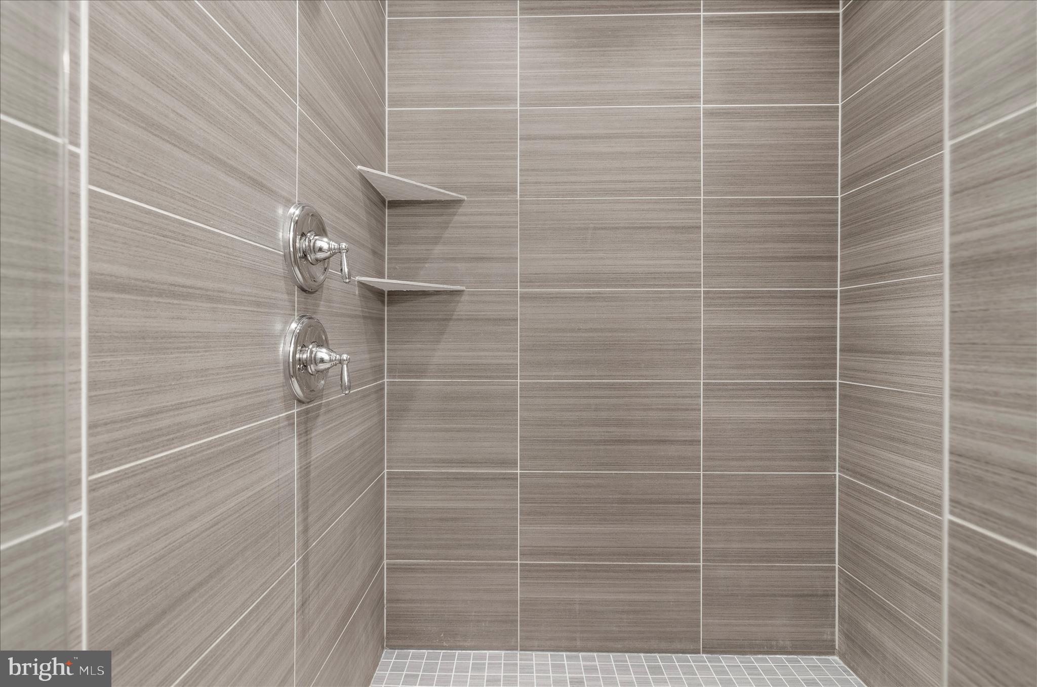 932 South Clinton Street Baltimore, MD 21224 - Photo 17 of 46 a bathroom with a shower