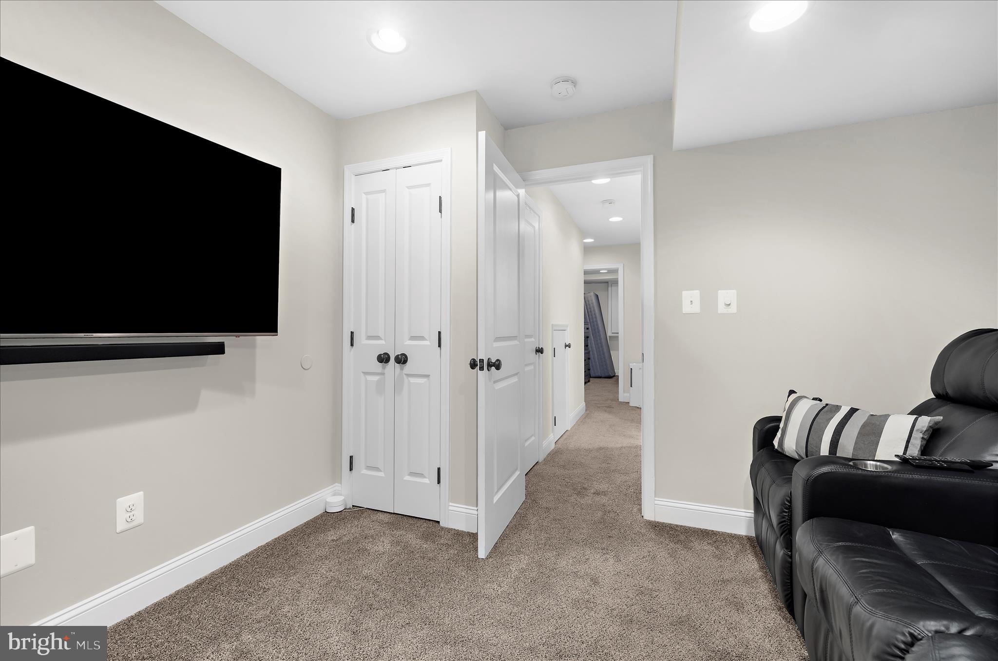 932 South Clinton Street Baltimore, MD 21224 - Photo 30 of 46 a living room with furniture and a flat screen tv