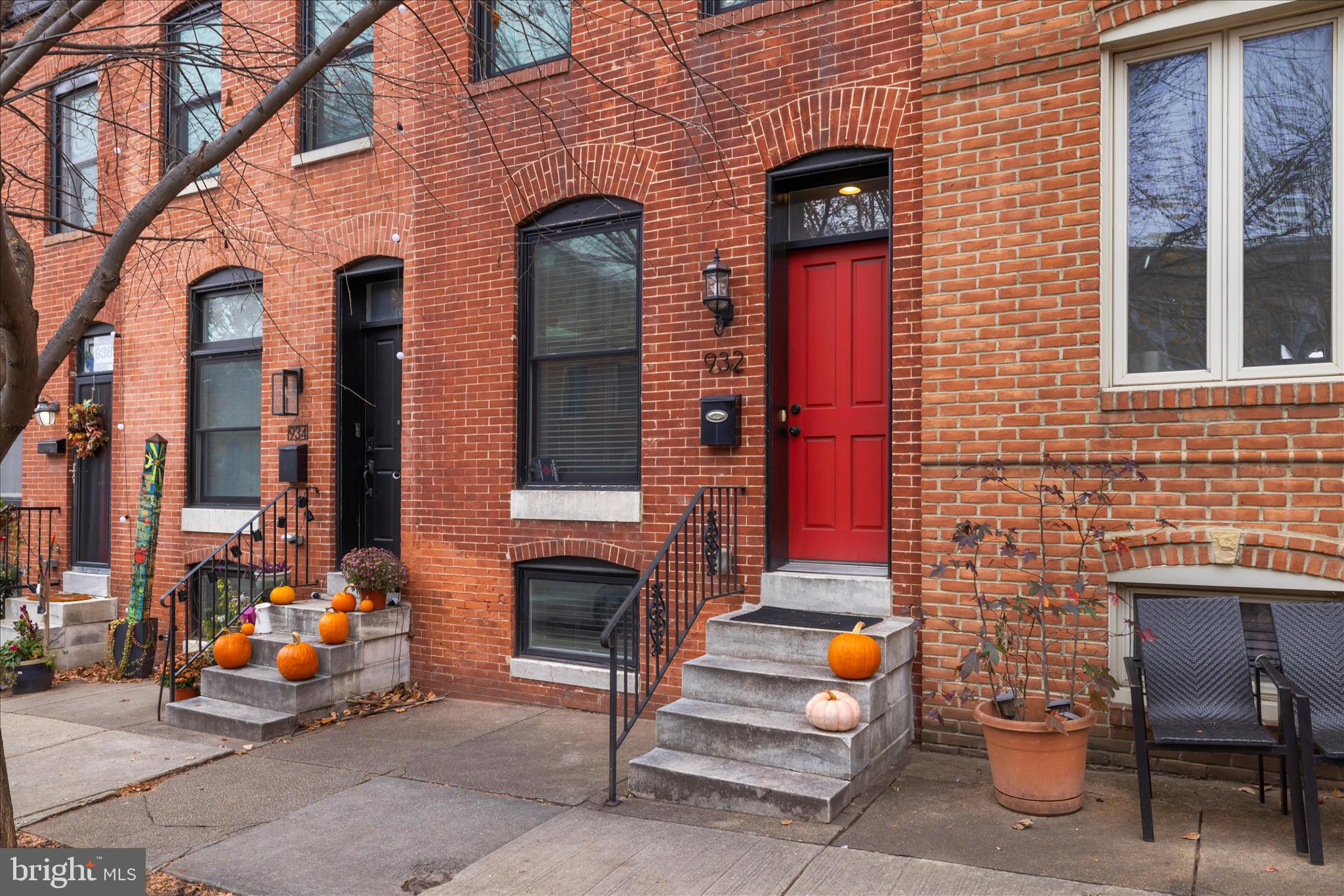 932 South Clinton Street Baltimore, MD 21224 - Photo 3 of 46 a view of a brick building with many windows