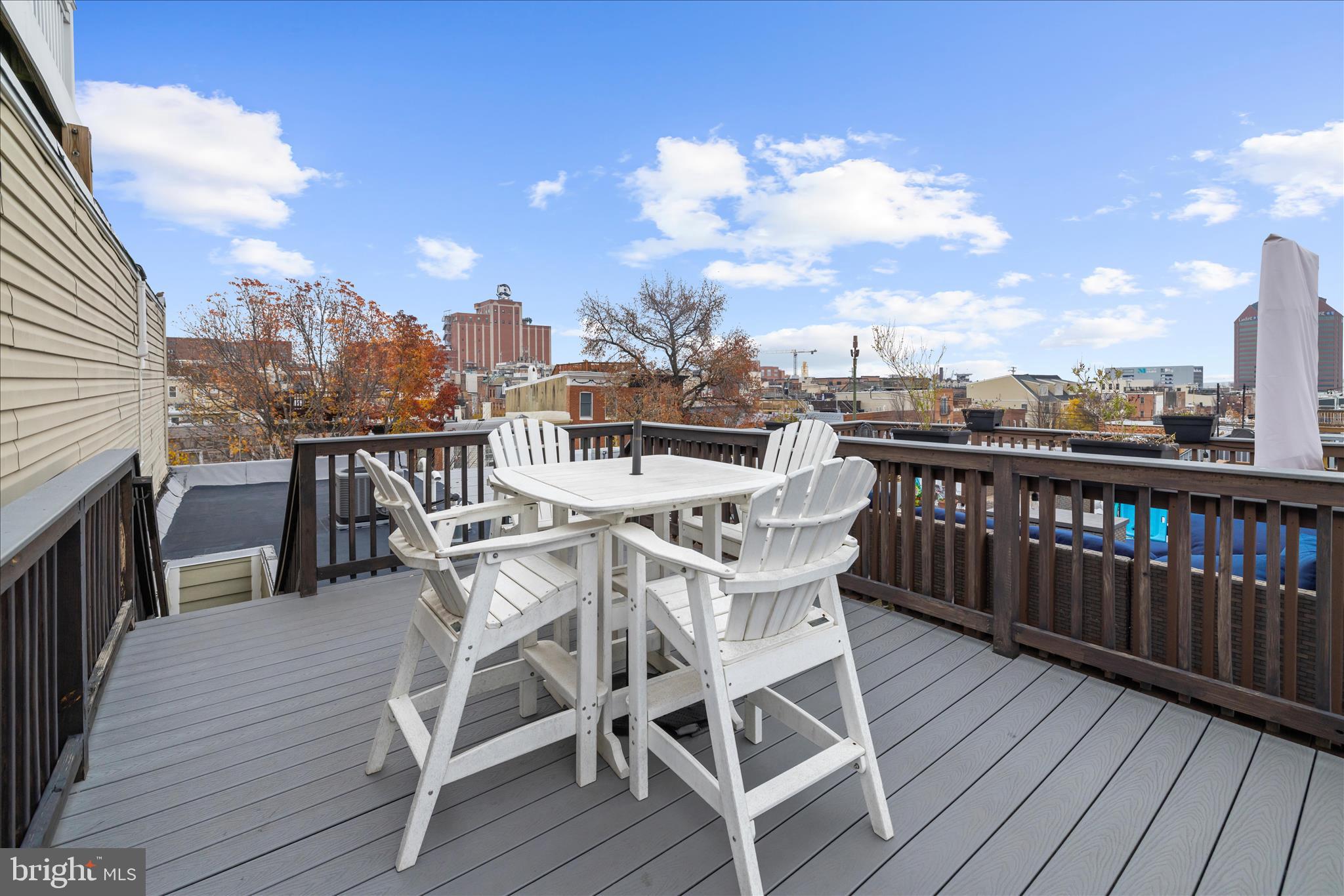 932 South Clinton Street Baltimore, MD 21224 - Photo 33 of 46 a view of a terrace with wooden benches