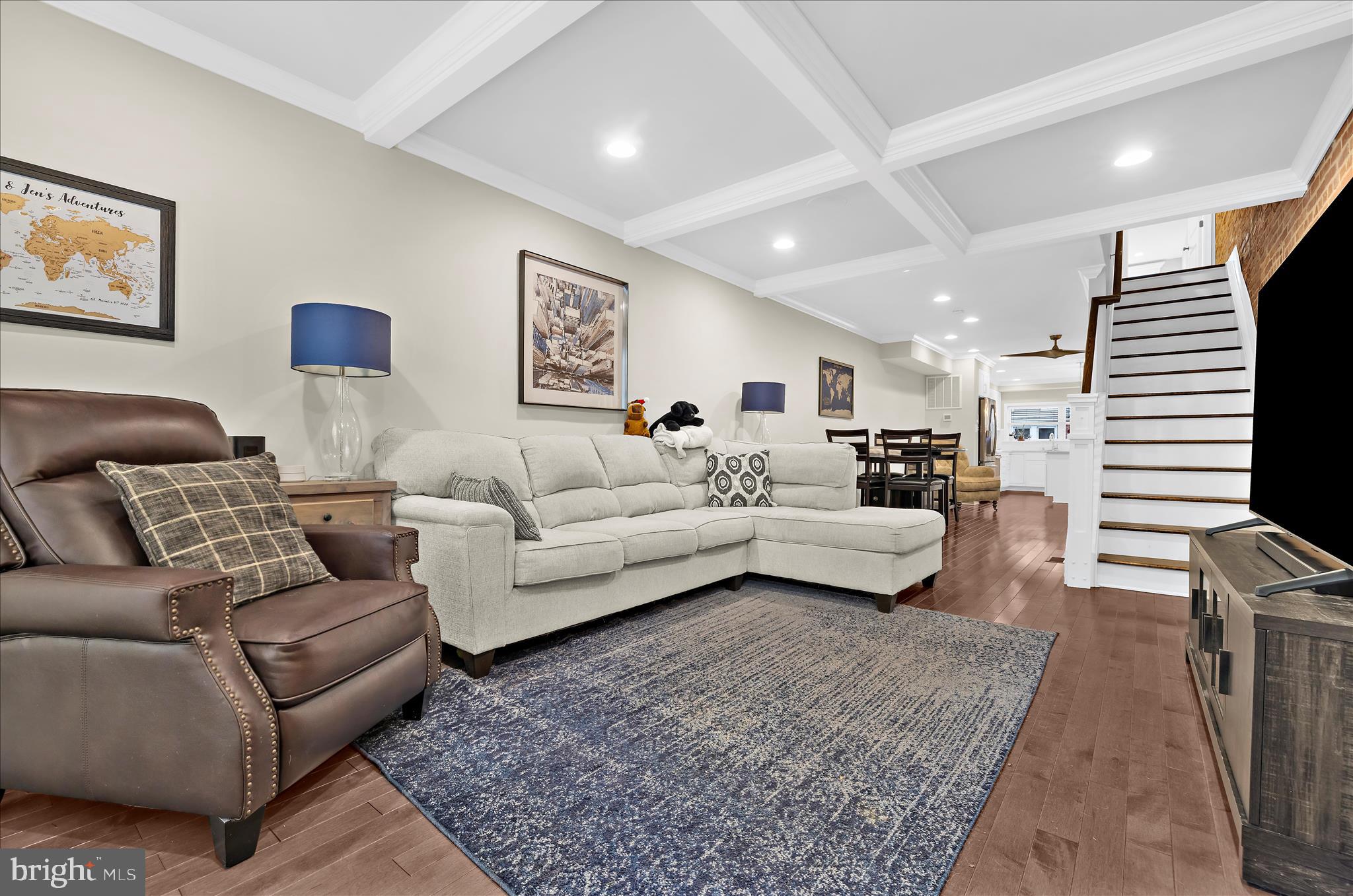 932 South Clinton Street Baltimore, MD 21224 - Photo 4 of 46 a living room with furniture and a couch