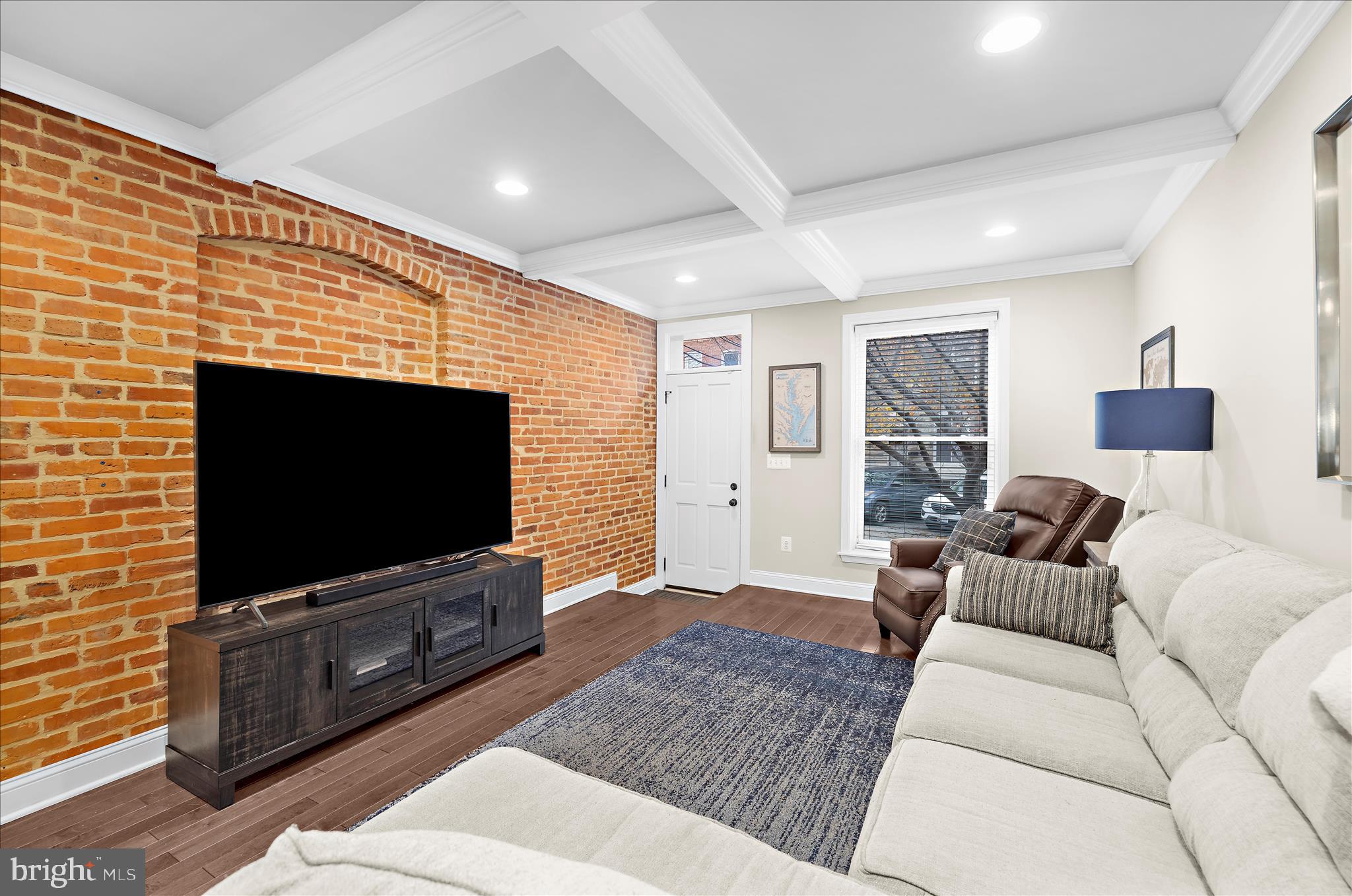 932 South Clinton Street Baltimore, MD 21224 - Photo 7 of 46 a living room with furniture and a flat screen tv