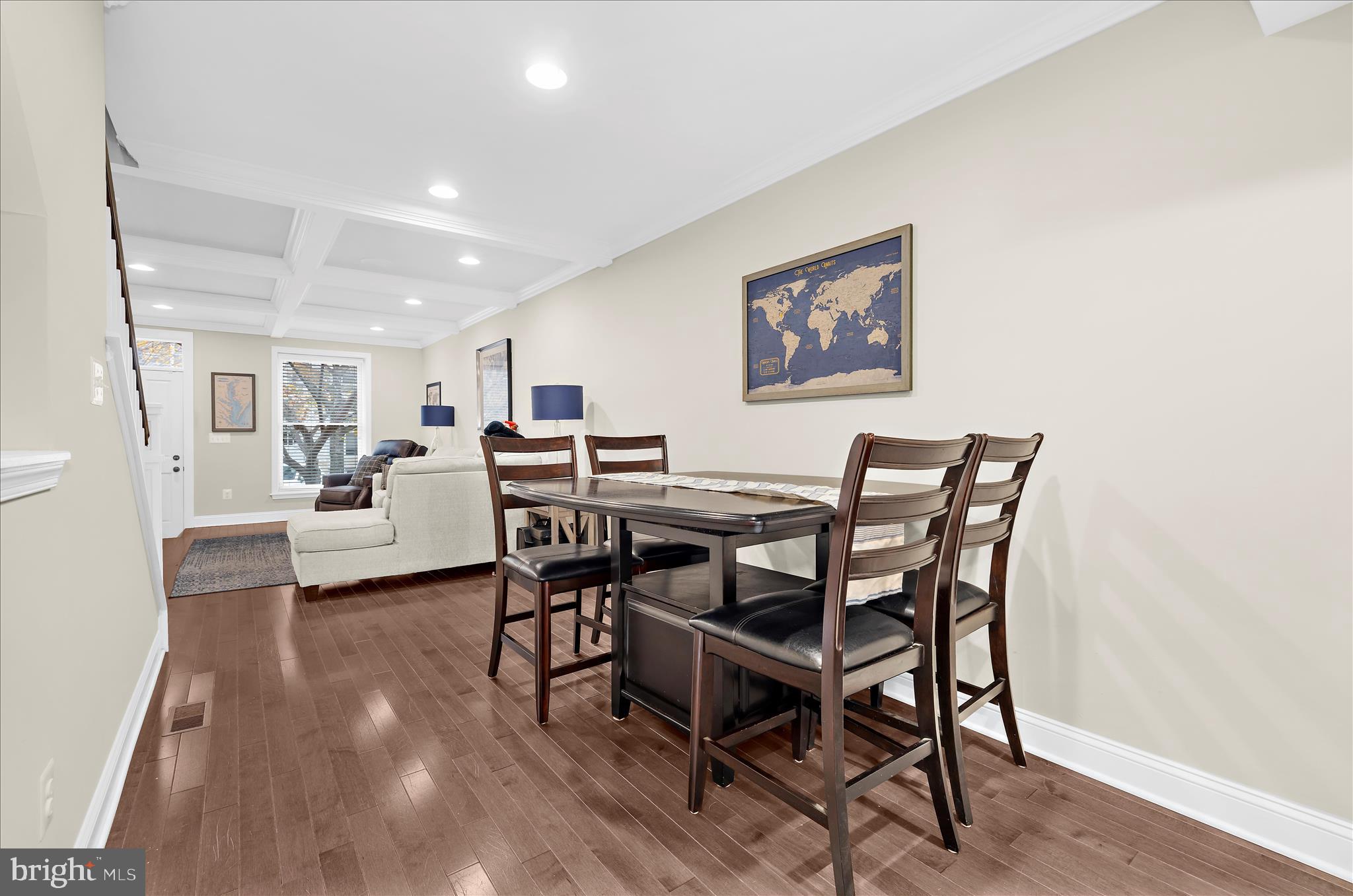932 South Clinton Street Baltimore, MD 21224 - Photo 9 of 46 a view of a dining room with furniture and wooden floor