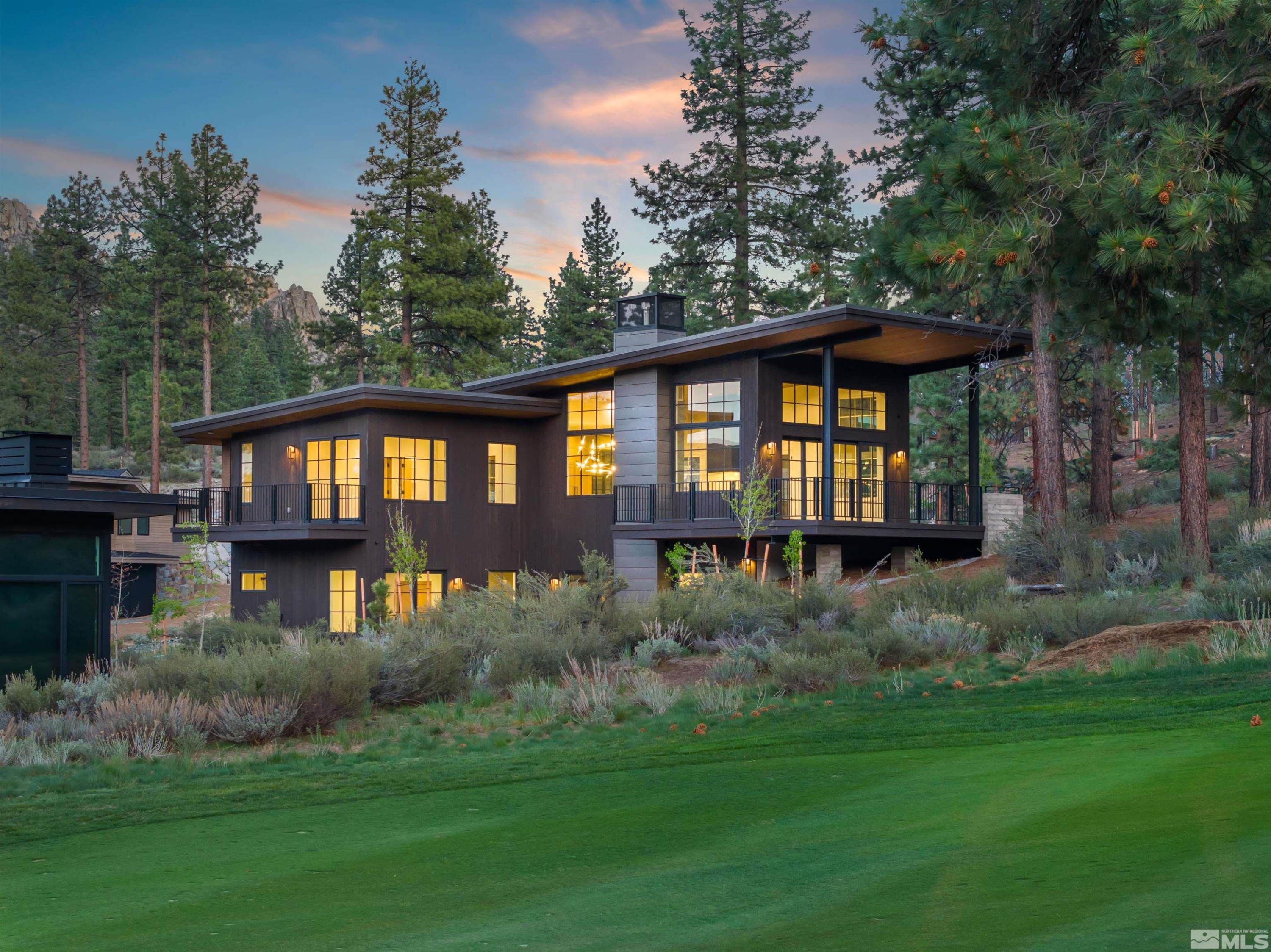 265 Mill Race Loop Carson City, NV 89705 - Photo 1 of 40 a front view of a house with a yard