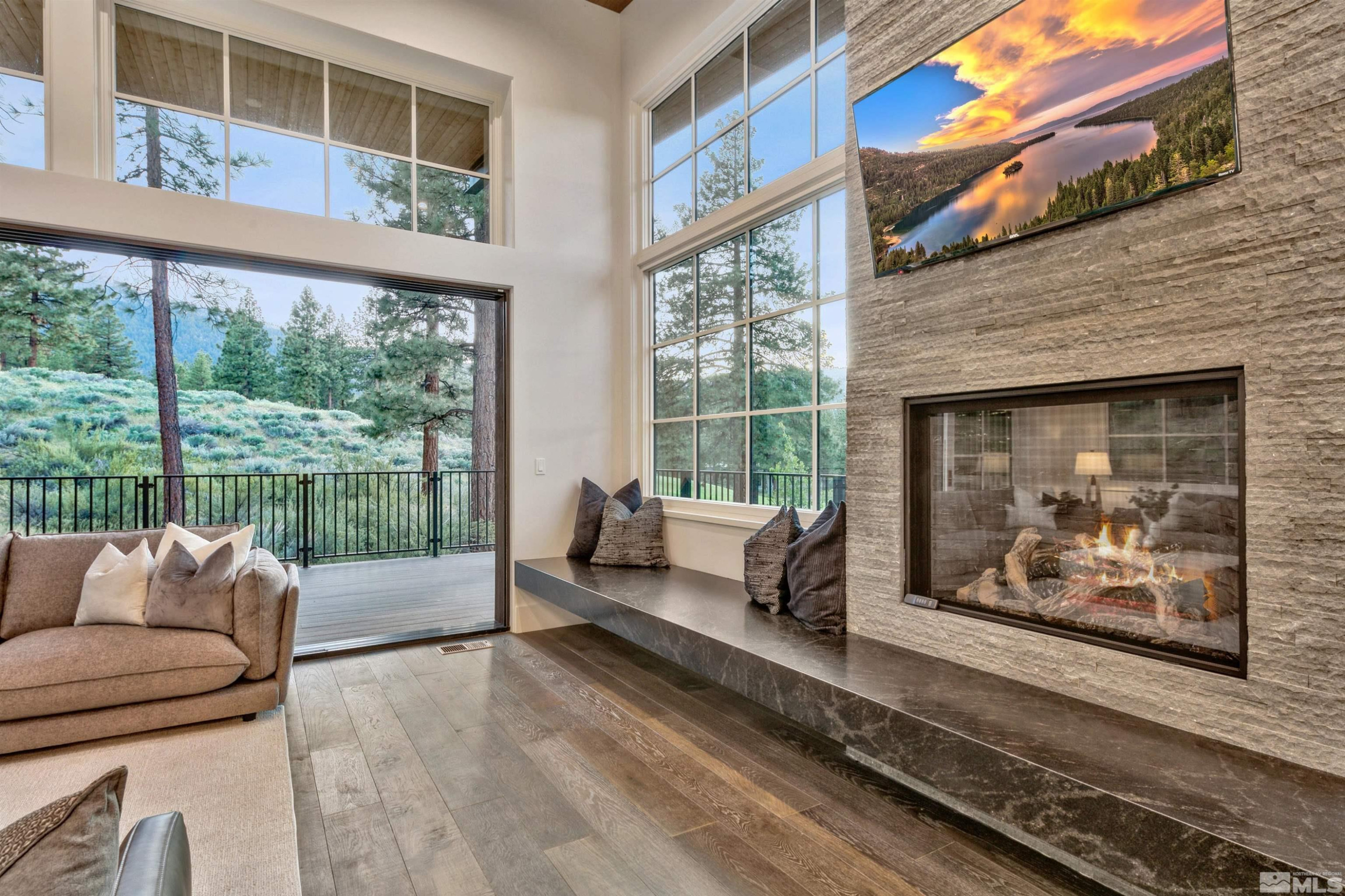 265 Mill Race Loop Carson City, NV 89705 - Photo 14 of 40 a living room with furniture and a fireplace