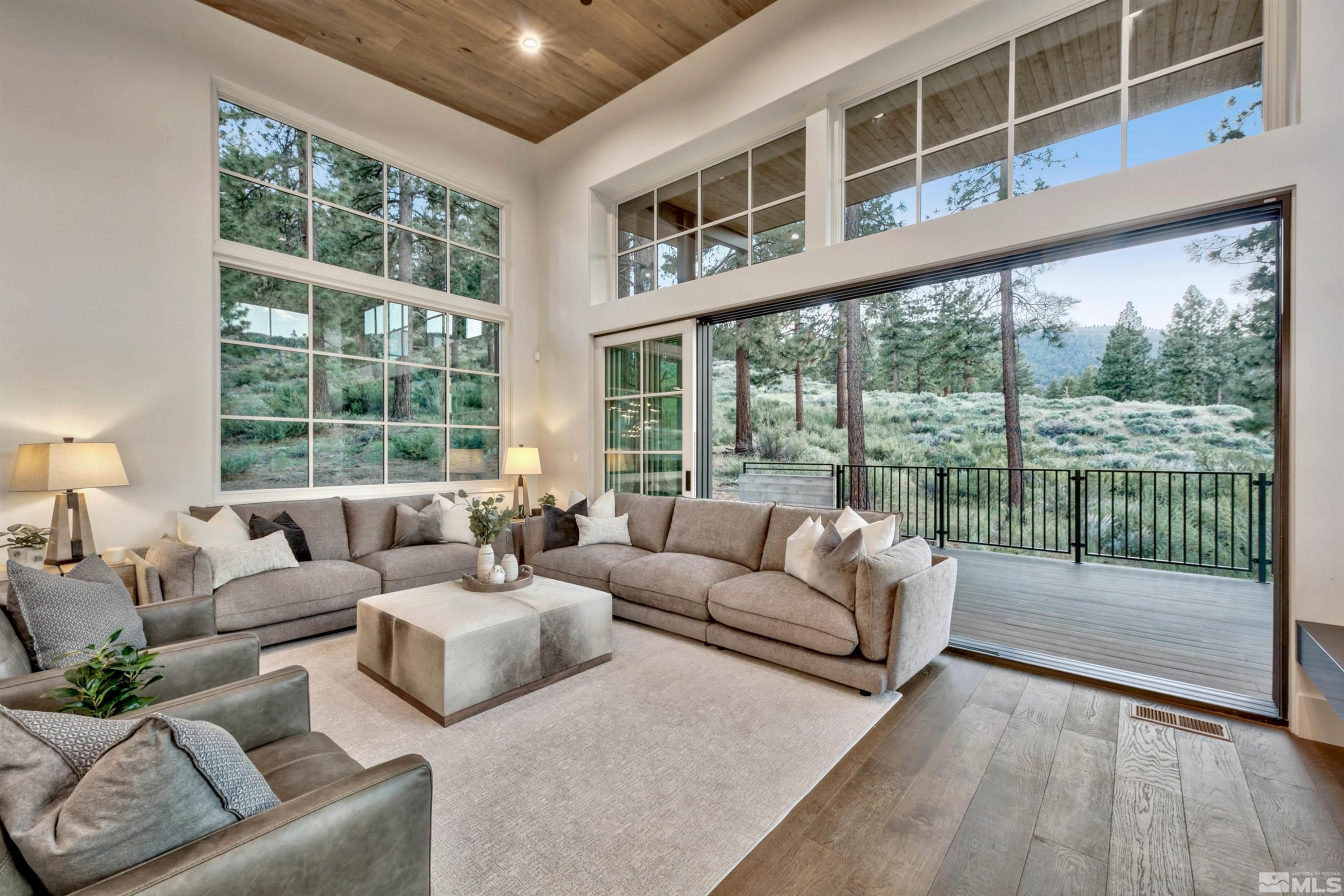 265 Mill Race Loop Carson City, NV 89705 - Photo 10 of 40 a living room with furniture and floor to ceiling windows