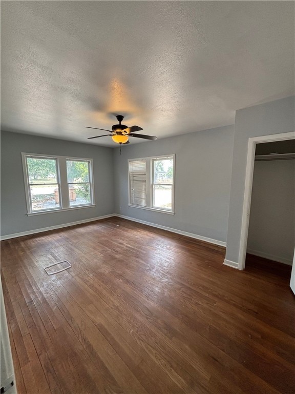 4130 Up River Road Corpus Christi, TX 78408 - Photo 7 of 7 an empty room with wooden floor and windows