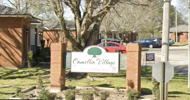 a sign on the side of a road