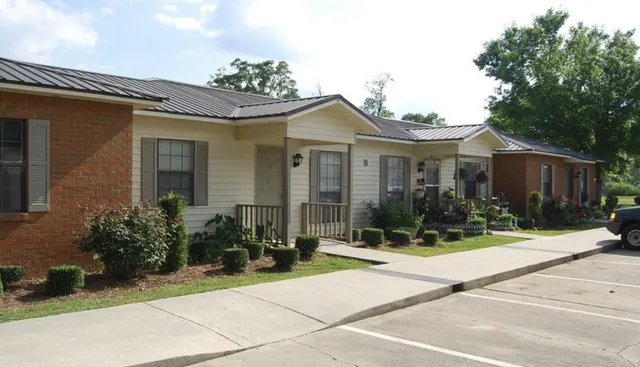 a front view of a house with yard