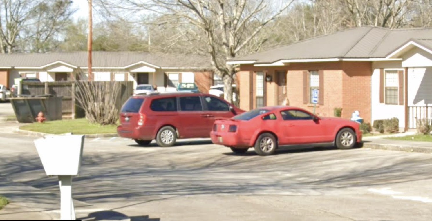 9 Camellia Drive Rome, GA 30165 - Photo 5 of 6 a view of a car is parked in front of a building
