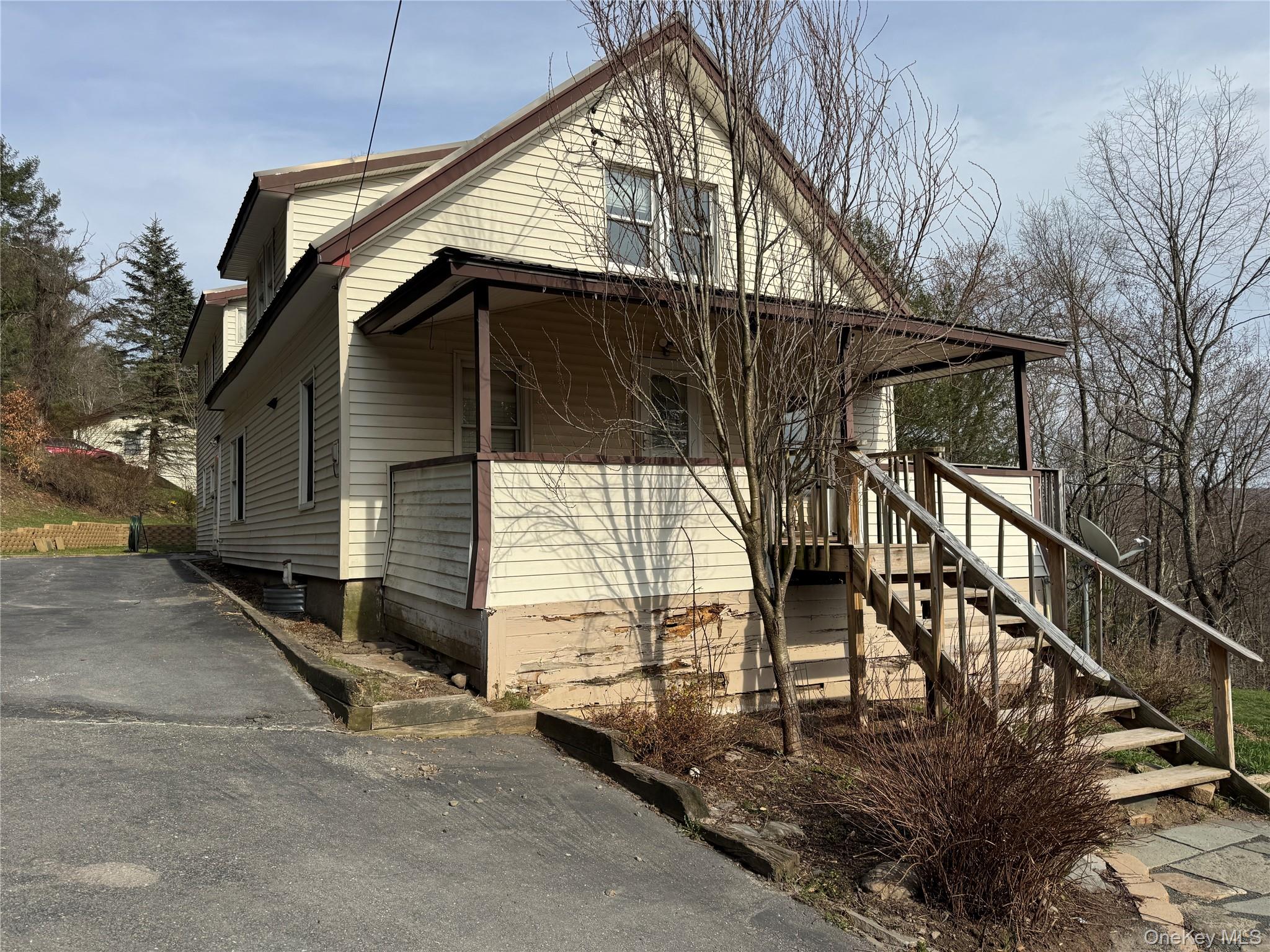 96 White Roe Lake Road Livingston Manor, NY 12758 - Photo 2 of 31 Covered porch on the main entry