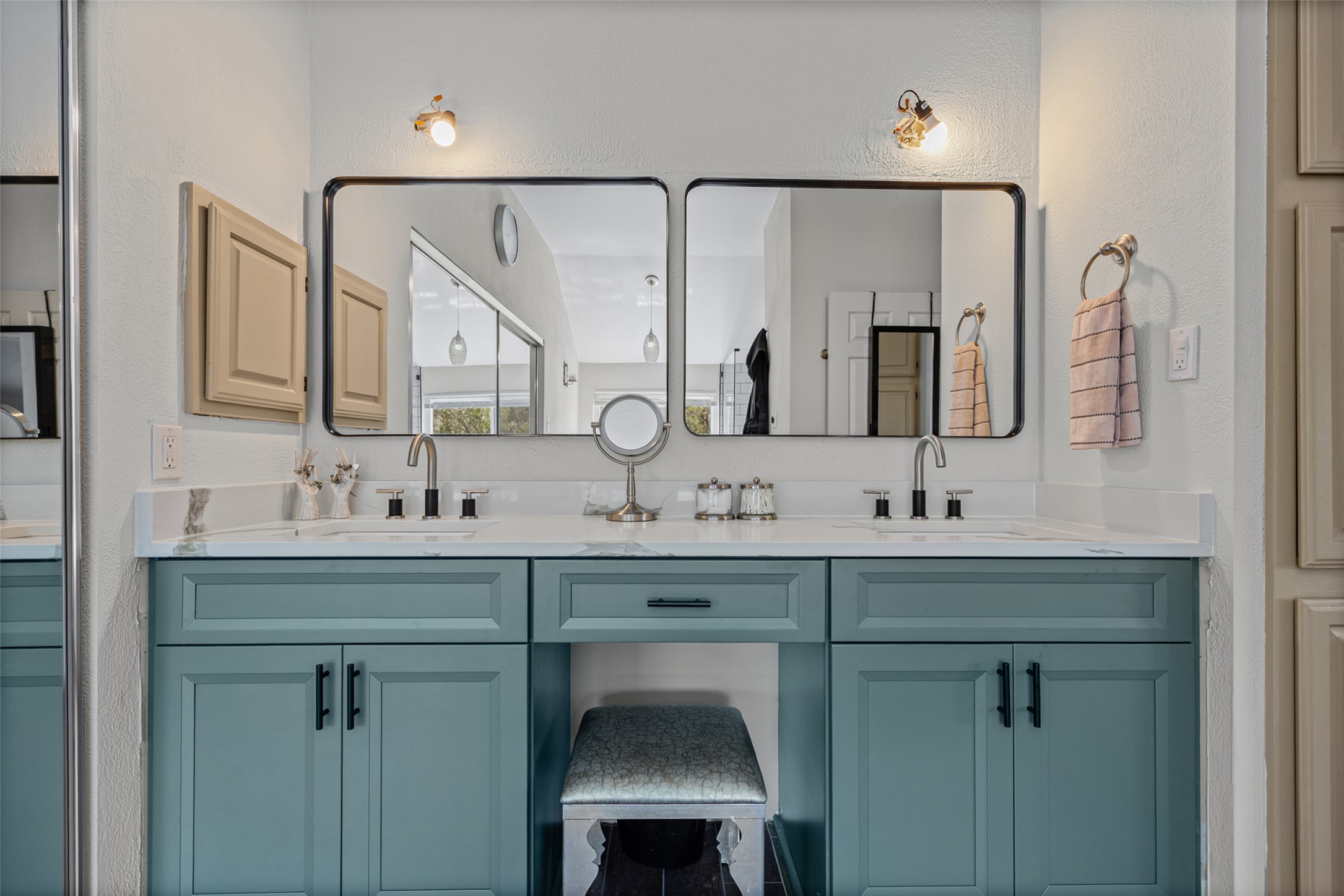 3011 Wadsworth Way Austin, TX 78748 - Photo 26 of 35 Dual vanities with sleek fixtures define this contemporary bathroom, offering both style and functionality.
