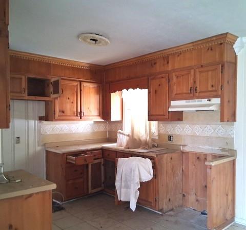 123 West Main Street Kingston, GA 30145 - Photo 6 of 10 a kitchen with granite countertop a sink stove and cabinets