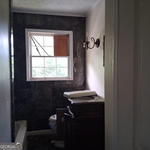 123 West Main Street Kingston, GA 30145 - Photo 8 of 10 a bathroom with a sink a toilet and a window