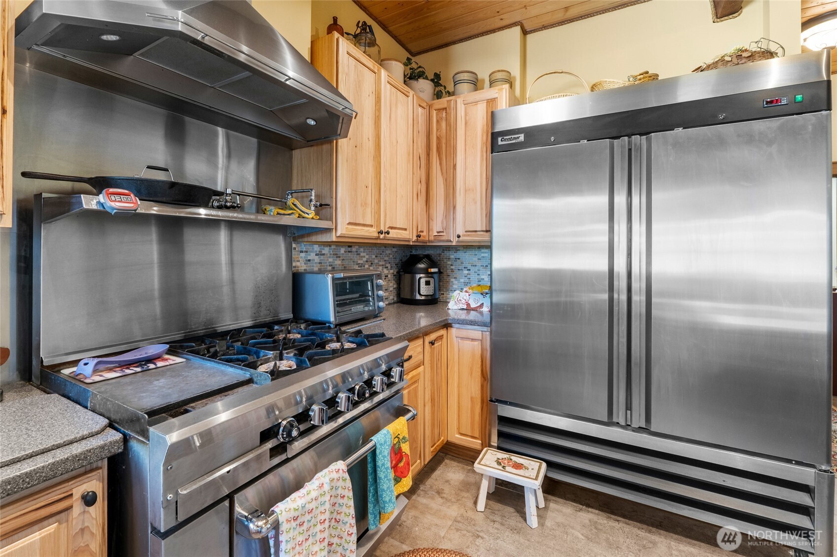 40 Happy Jack Road Curlew, WA 99118 - Photo 12 of 40 a kitchen with a stove and a refrigerator