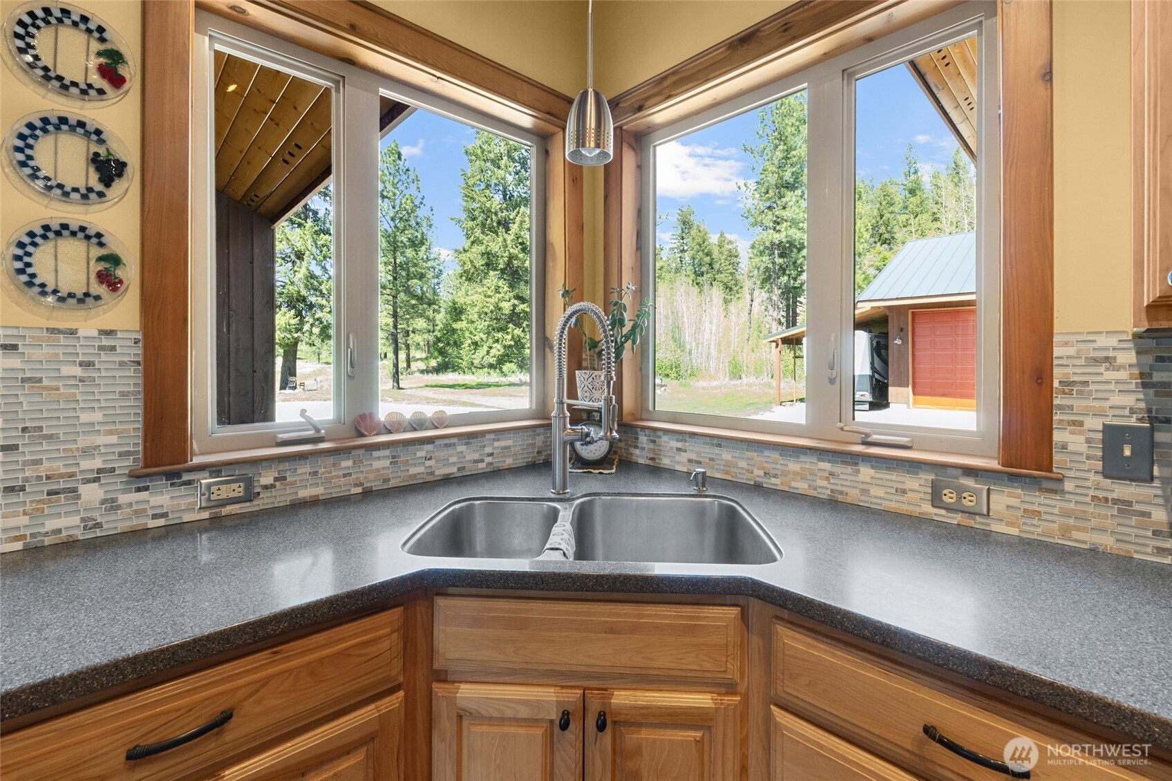 40 Happy Jack Road Curlew, WA 99118 - Photo 13 of 40 a kitchen with a sink and large window