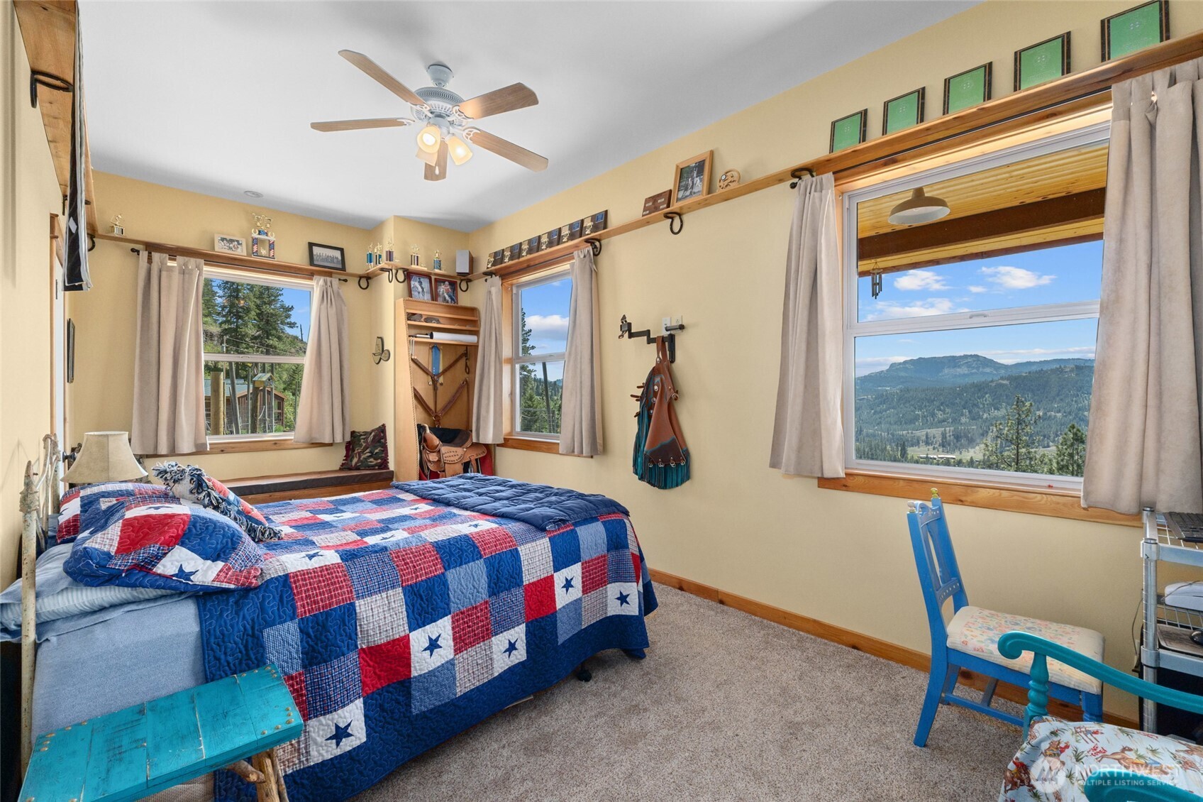 40 Happy Jack Road Curlew, WA 99118 - Photo 18 of 40 a bedroom with a bed a window and dresser