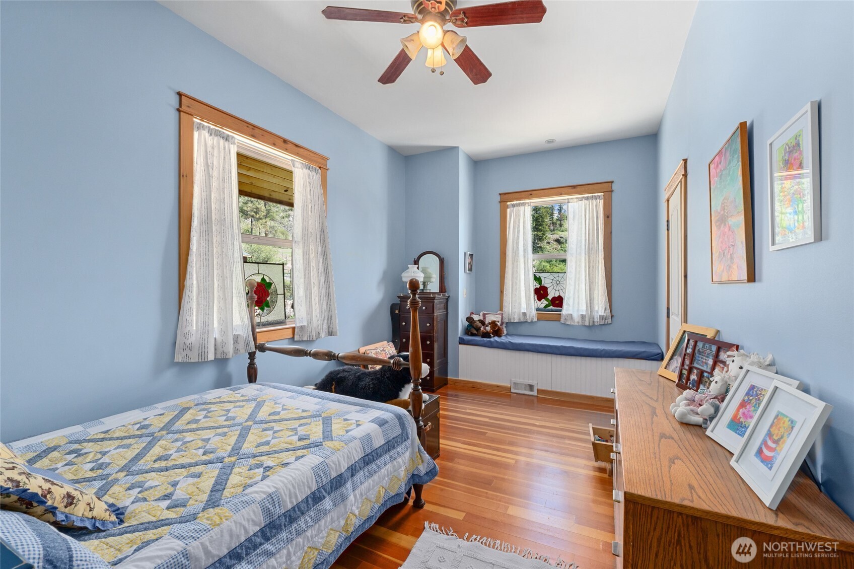 40 Happy Jack Road Curlew, WA 99118 - Photo 19 of 40 a bed sitting in a bedroom next to a window