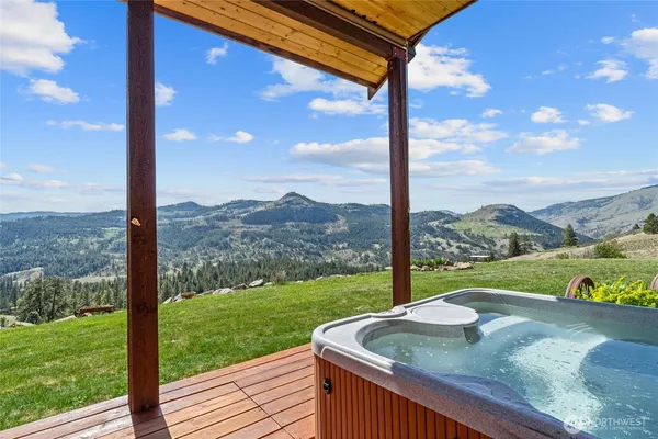 a view of a garden from a balcony