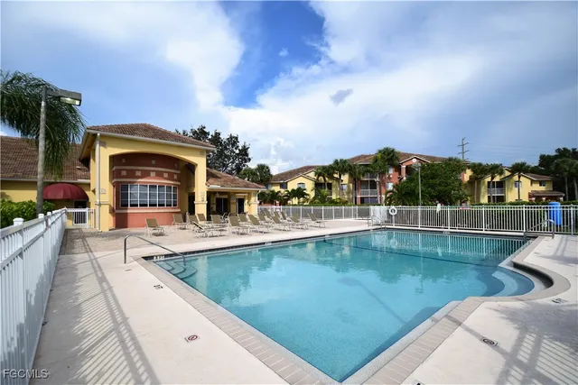 a view of a swimming pool with a patio