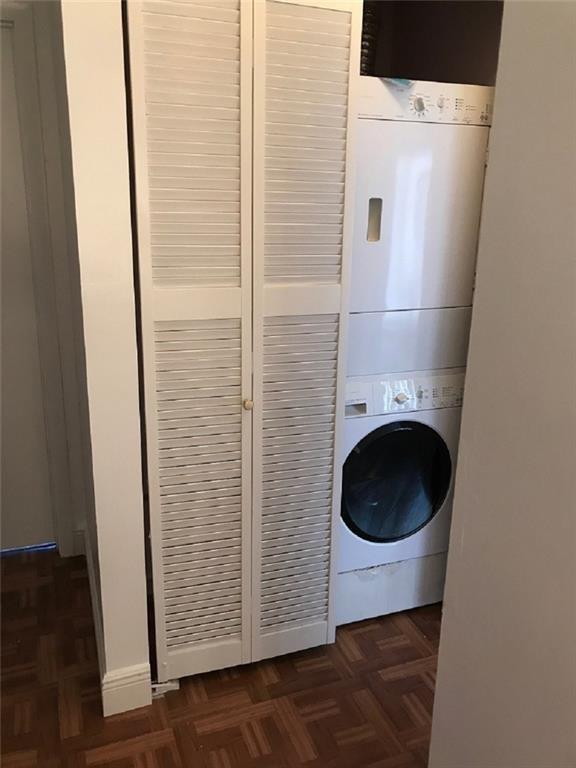 8031 Lagos De Campo Boulevard, Unit L3 Tamarac, FL 33321 - Photo 11 of 26 a bathroom with a sink and a washer dryer
