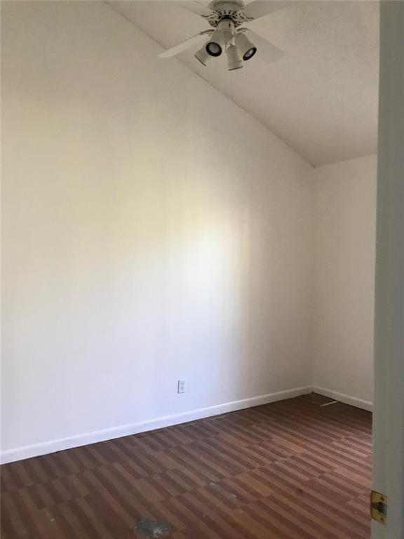 8031 Lagos De Campo Boulevard, Unit L3 Tamarac, FL 33321 - Photo 10 of 26 a view of a room with wooden floor