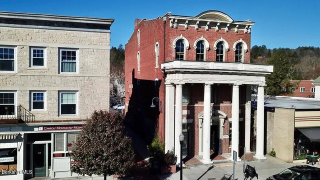a front view of a building with glass windows
