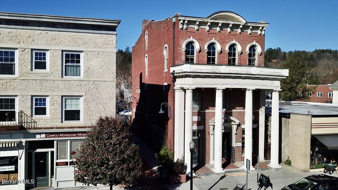 a front view of a building with glass windows