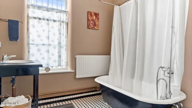 a room with a couch and a window