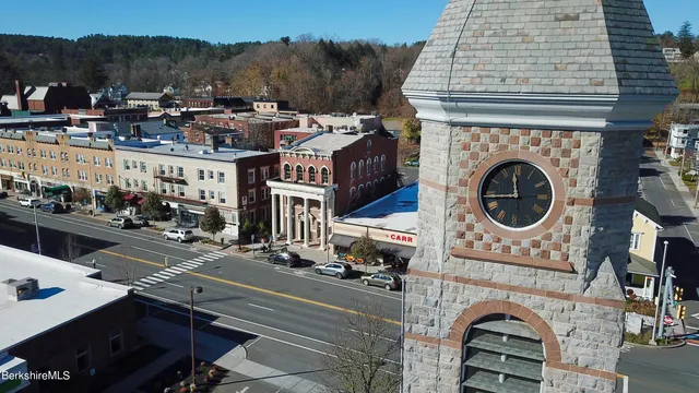 a view of a street with cars