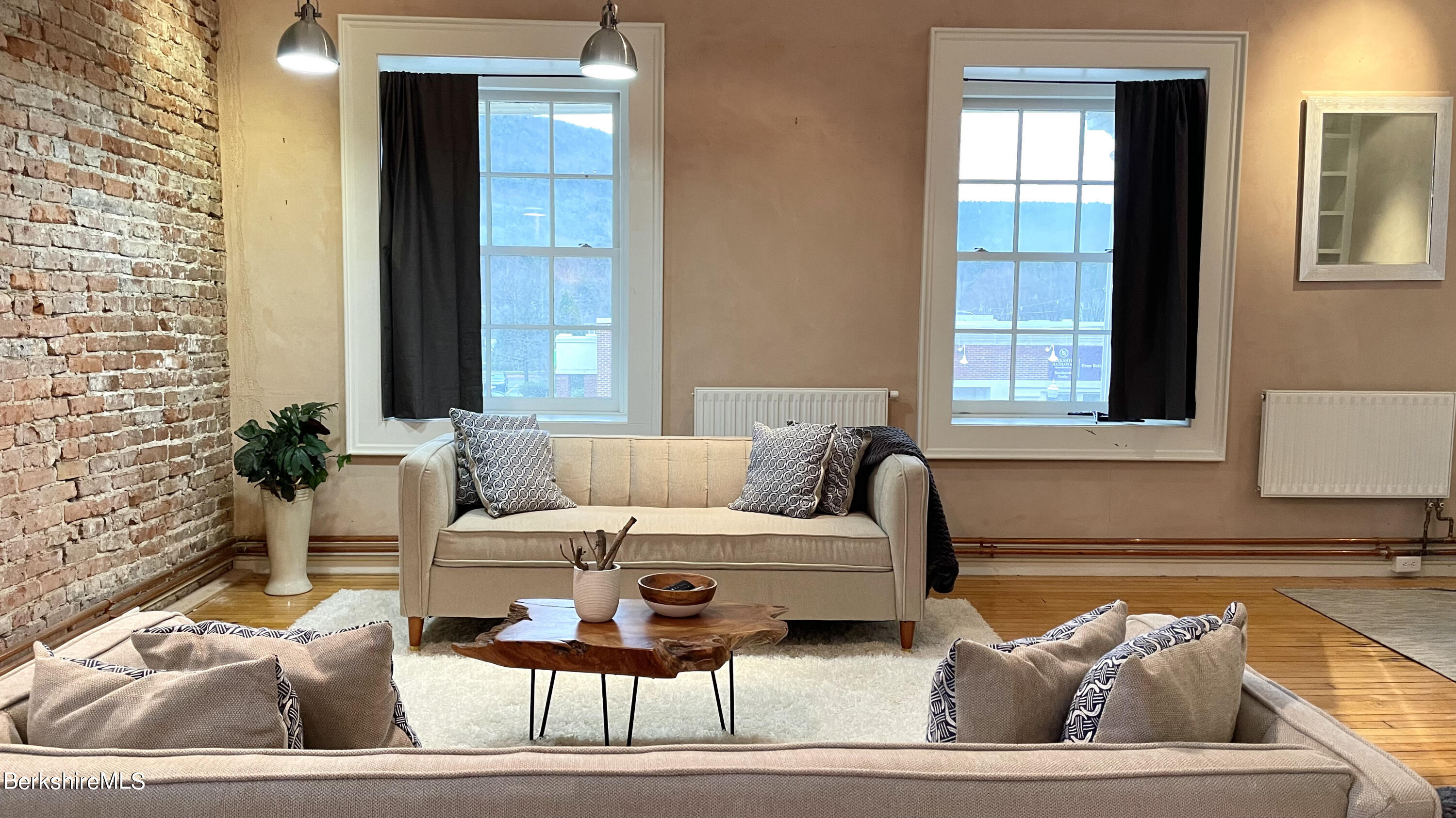264 Main Street, Unit B Great Barrington, MA 01230 - Photo 7 of 26 a living room with furniture and a window