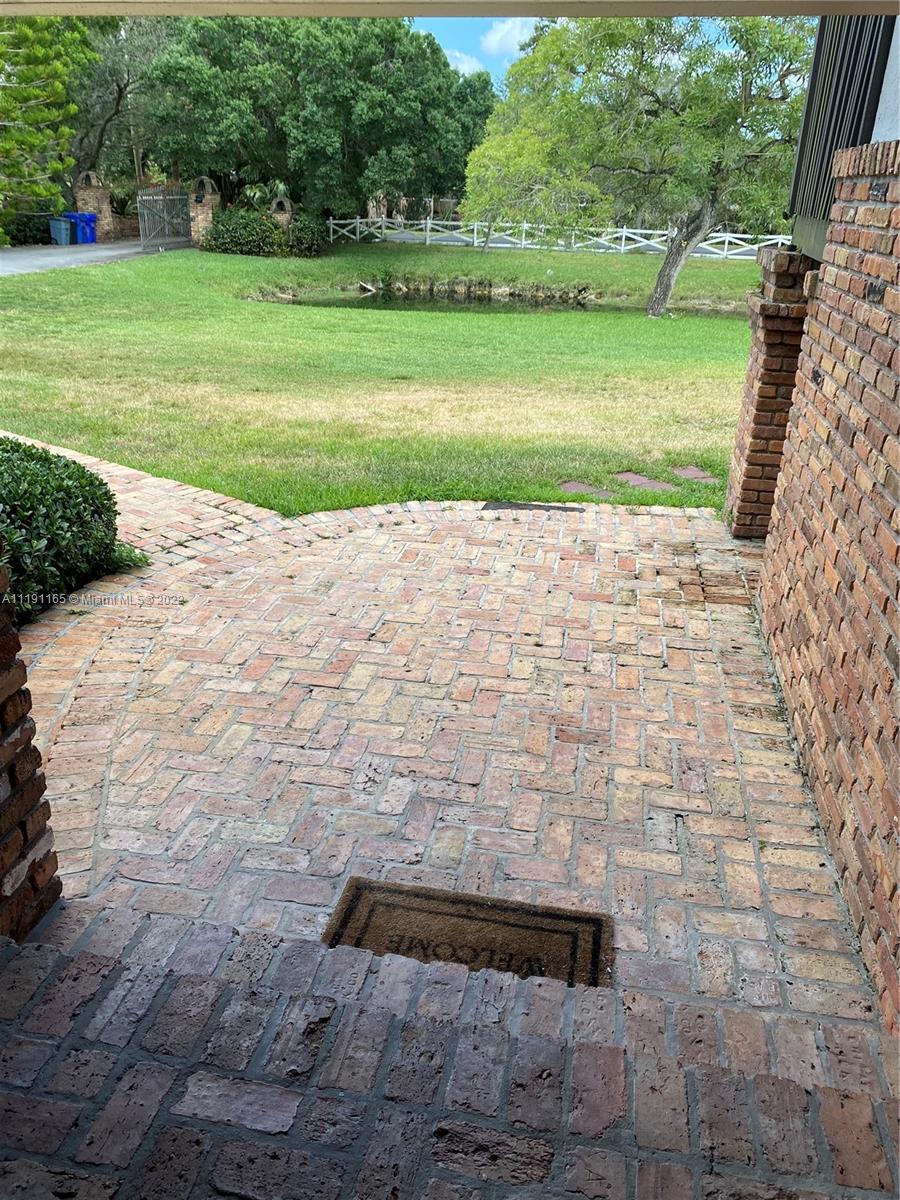 7111 Holatee Trail Southwest Ranches, FL 33330 - Photo 6 of 13 a view of a yard with an trees