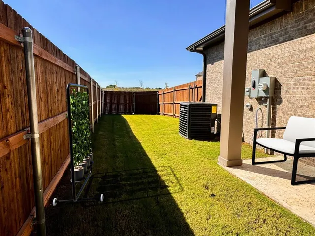 a view of swimming pool with furniture