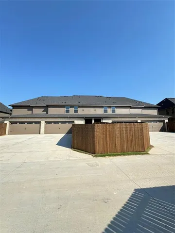a view of a kitchen with a dishwasher and cabinets