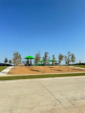 a view of a swimming pool and an outdoor space
