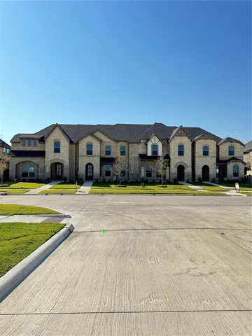 a view of houses with a swimming pool
