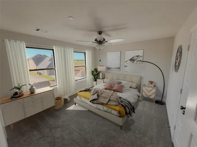 a bedroom with bed and window