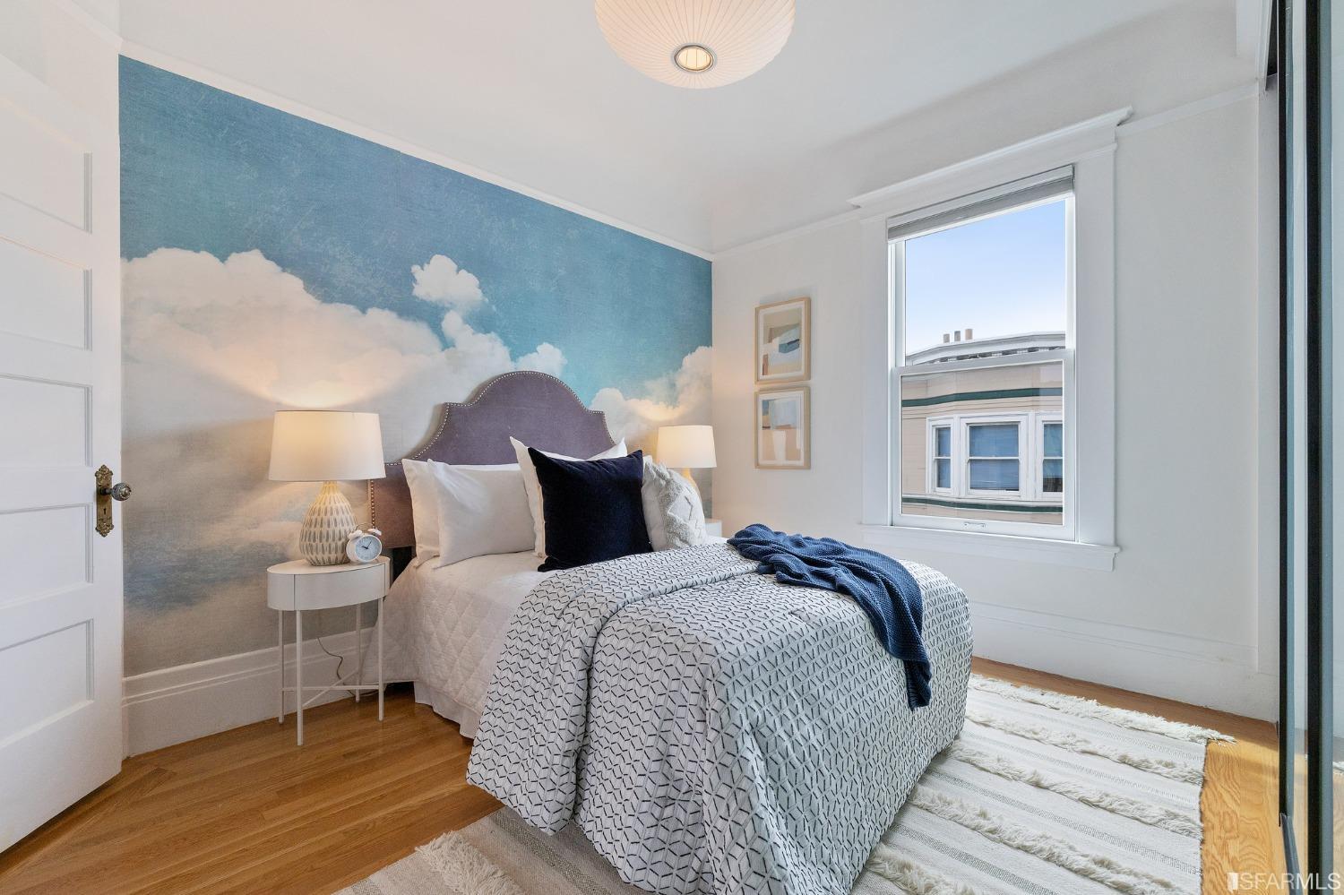 394 Elizabeth Street San Francisco, CA 94114 - Photo 16 of 33 a bedroom with a bed and a window