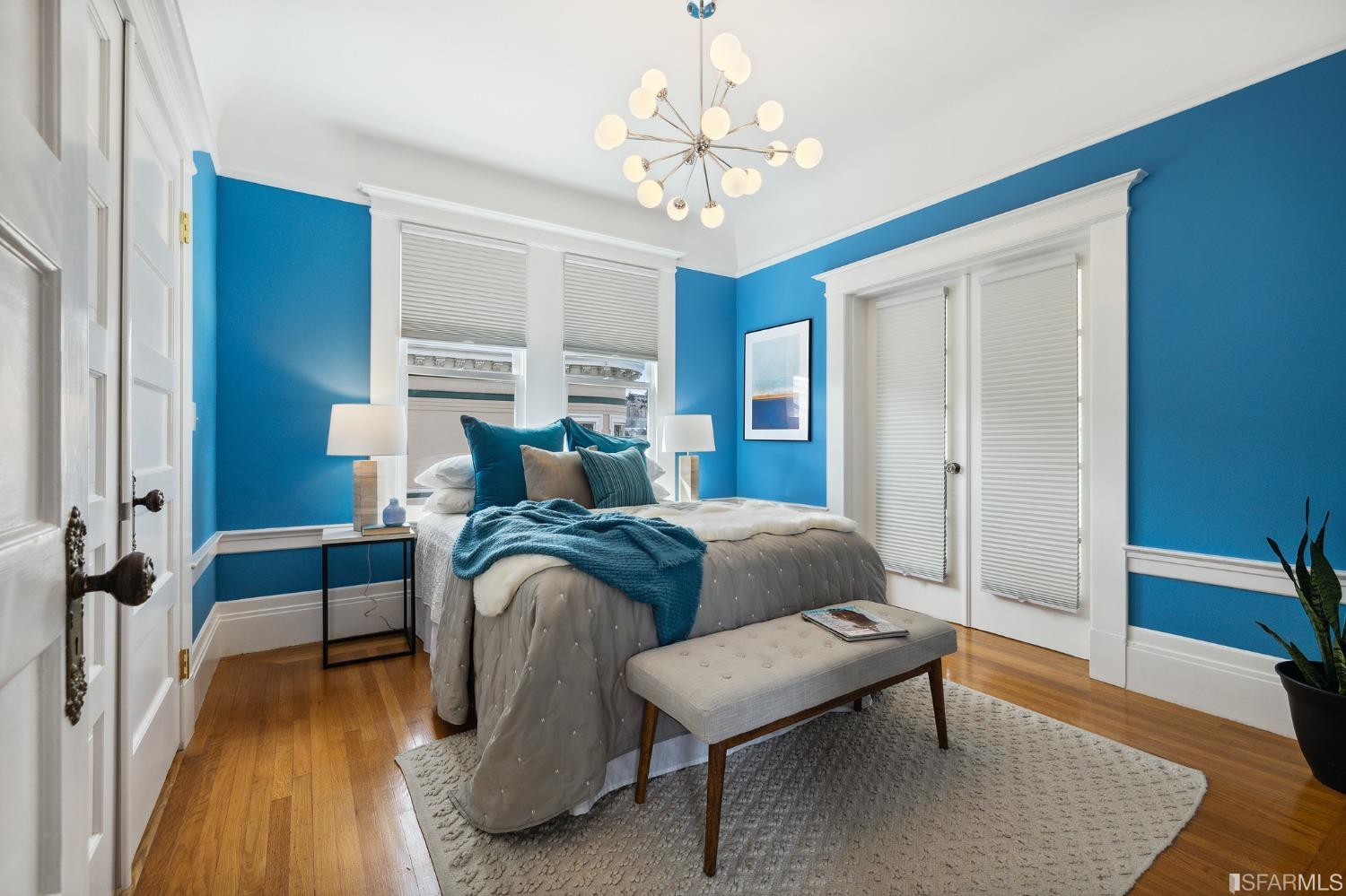 394 Elizabeth Street San Francisco, CA 94114 - Photo 19 of 33 a living room with furniture and a chandelier