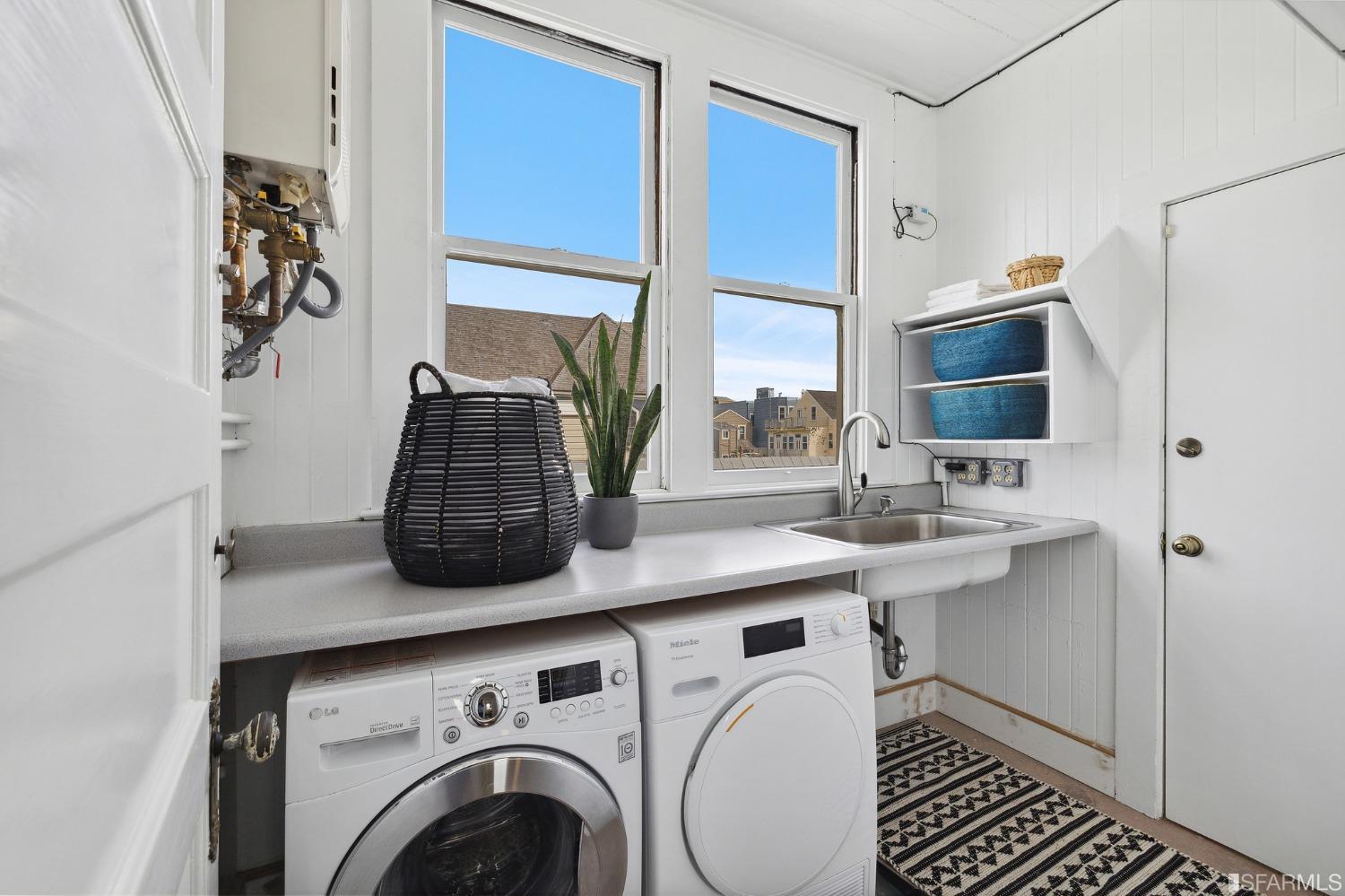 394 Elizabeth Street San Francisco, CA 94114 - Photo 24 of 33 a bathroom with a sink and a mirror