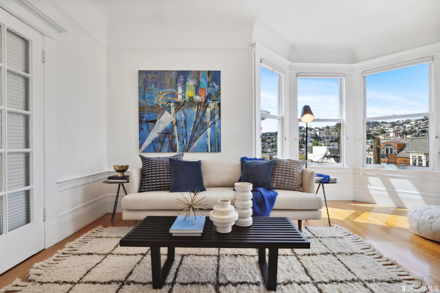 394 Elizabeth Street San Francisco, CA 94114 - Photo 27 of 33 a living room with furniture and a rug