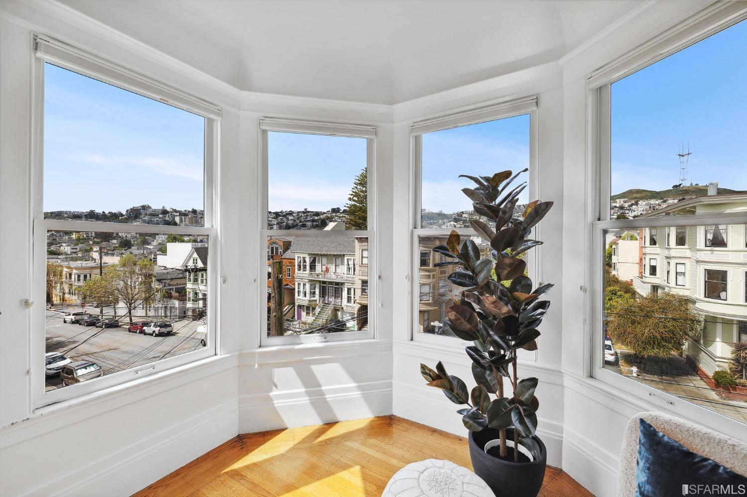 394 Elizabeth Street San Francisco, CA 94114 - Photo 5 of 33 a living room with furniture and a large window