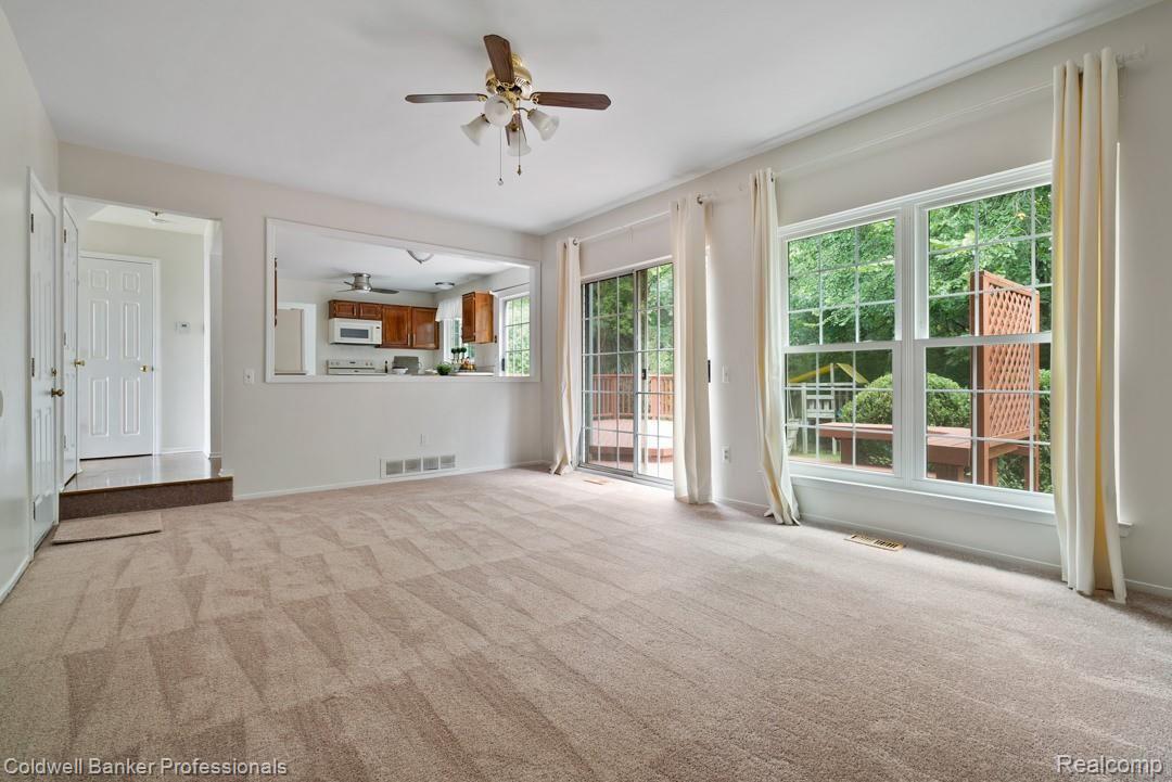 495 Bolinger Street Rochester, MI 48307 - Photo 13 of 30 View from family room into kitchen, hallway and outside.