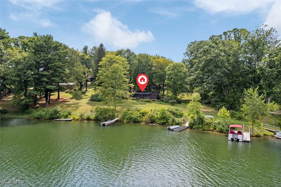 6103 Azalea Road Southwest, Unit LOT 6 Bowerston, OH 44695 - Photo 1 of 24 Drone / aerial view of a large body of water