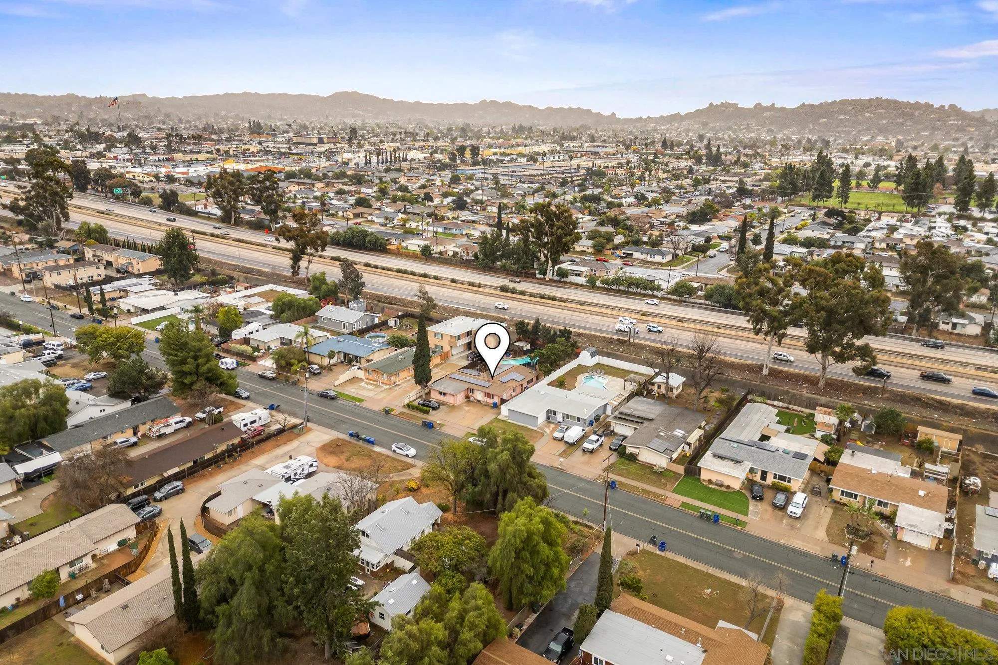 1163 Naranca Avenue El Cajon, CA 92021 - Photo 13 of 15 an aerial view of residential houses with outdoor space