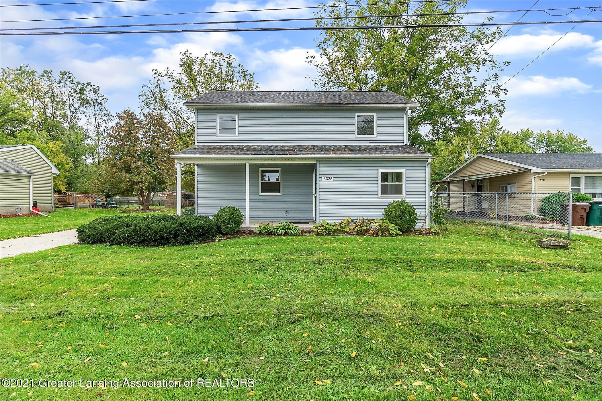 3325 West Holmes Road Lansing, MI 48911 - Photo 3 of 28 03-3325-W-Holmes-Rd-WindowStill-Real-Est