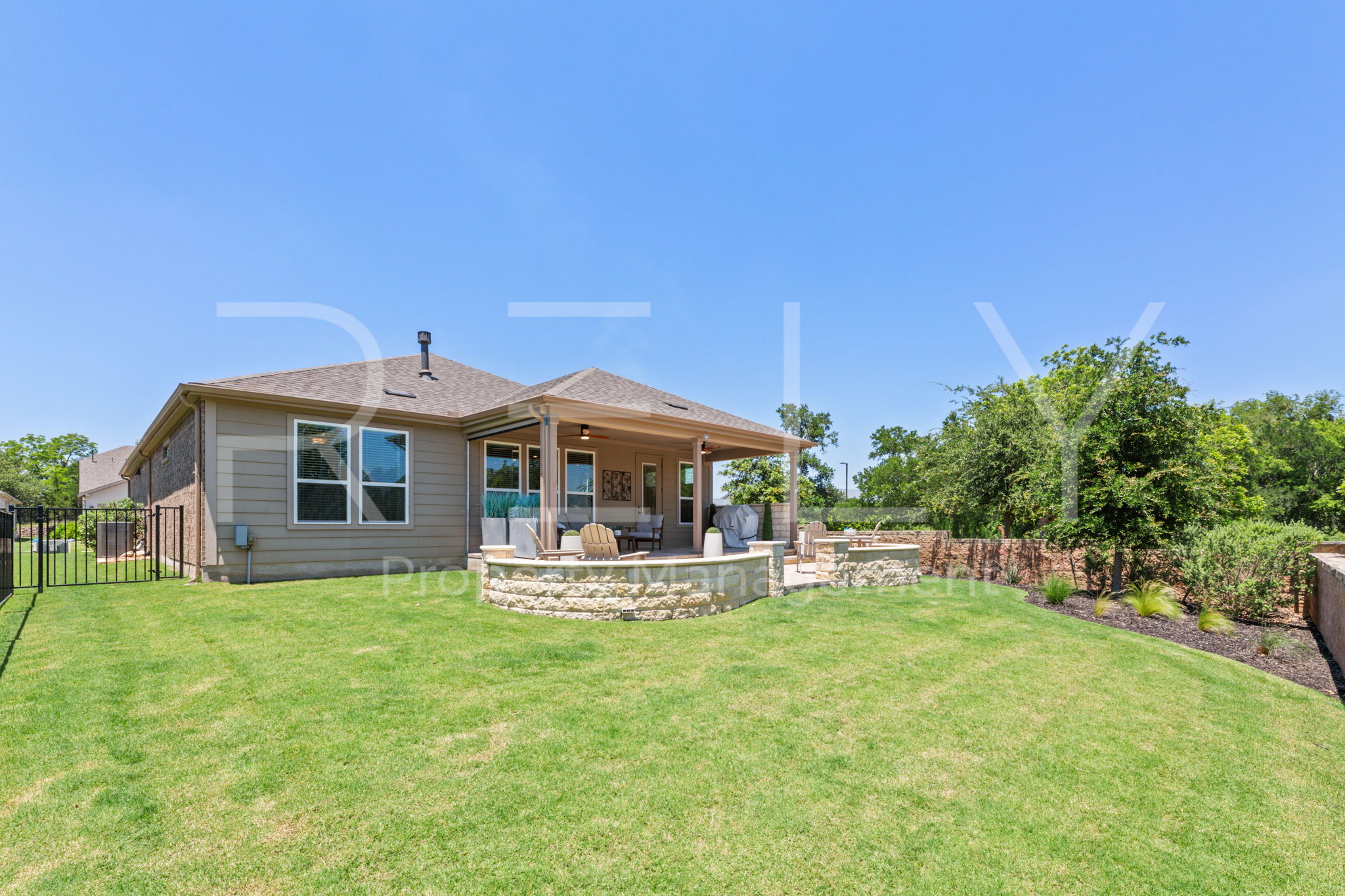 101 Spanish Star Street Georgetown, TX 78633 - Photo 35 of 39 A private, fenced yard provides ample space for relaxation and outdoor activities.